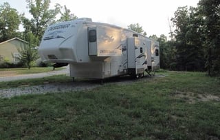 A 5th wheel travel trailer suited for 2 people