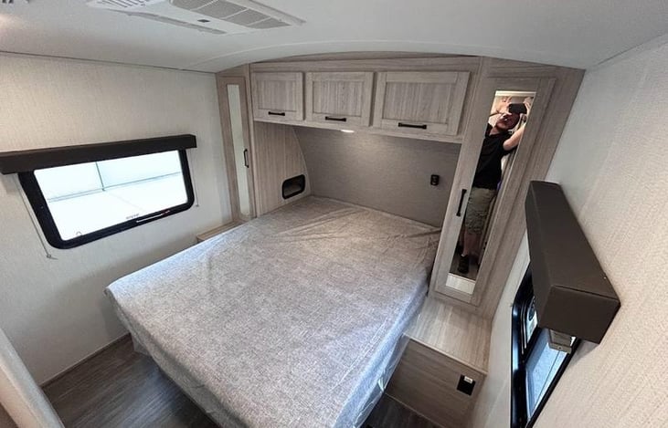 Queen bed- not pictured is a 3-inch mattress topper for the best sleep possible!