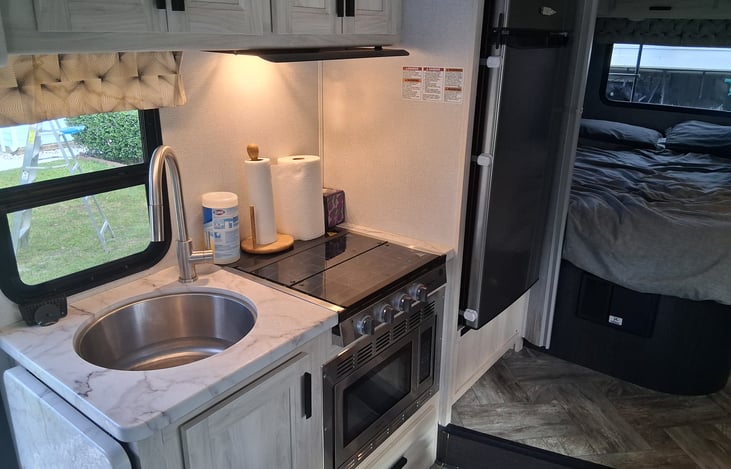 Microwave, oven and cook top.