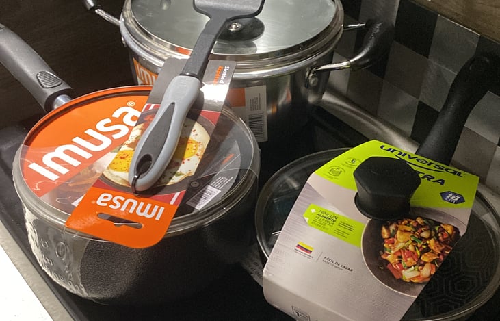 She comes with two pots and one pan with their respective covers.