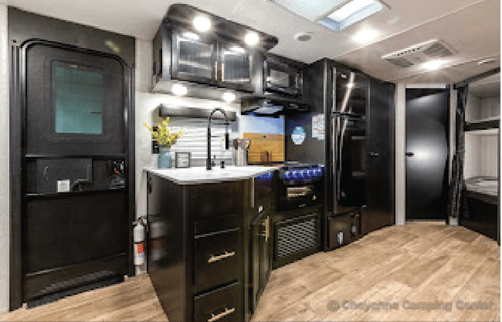 Kitchen area, pantry, bathroom door, bunks