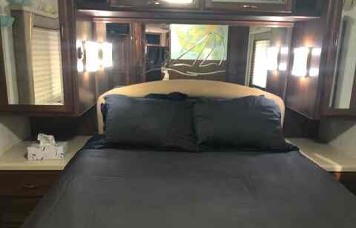 Super-comfy organic queen-sized bed with a variety of pillows