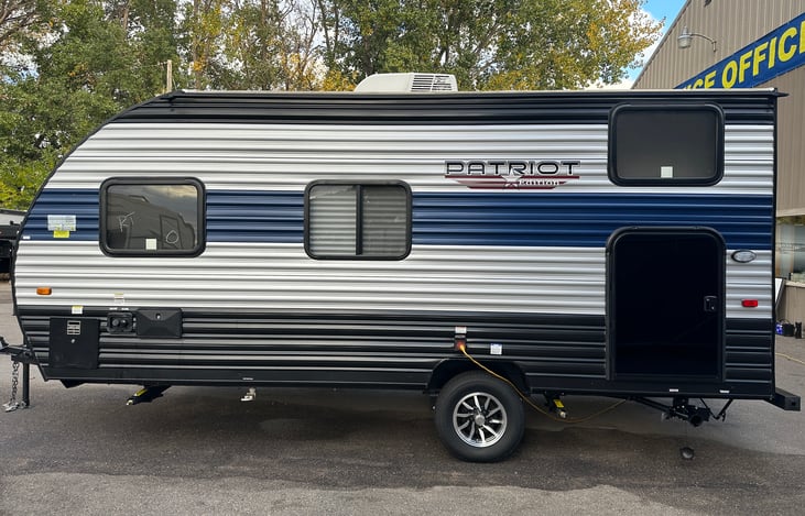 Check out the door at the rear.  There's TONS of storage capacity back there.  you can even fit 2 bikes!