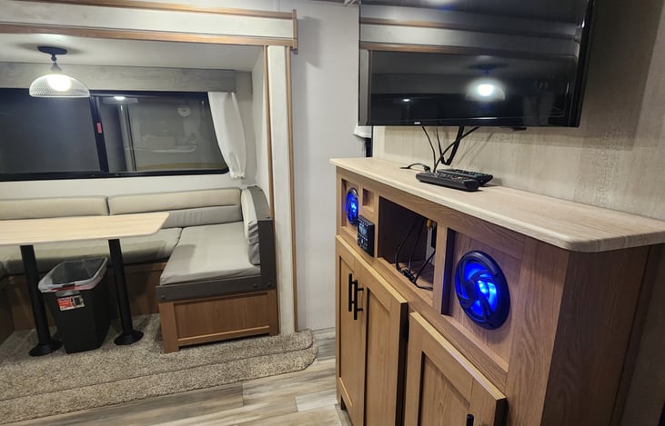 Common area entertainment system. Dinette converts to a bed.