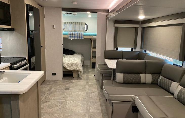 View from the fireplace with the pocket door to the bunk room open.