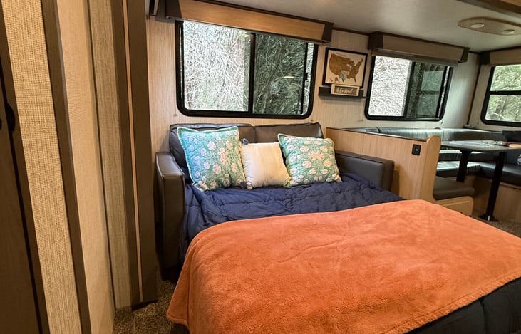 Sofa easily converts into a full-size bed, providing additional sleeping space with extra bedding provided.