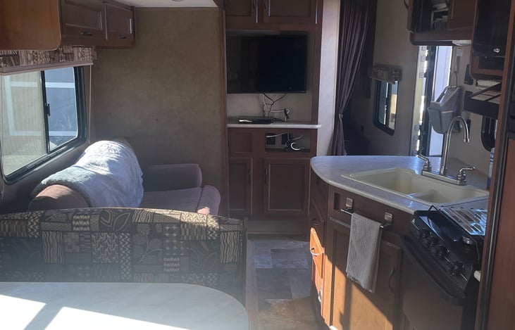 the couch and the dinnette slide out to double to space