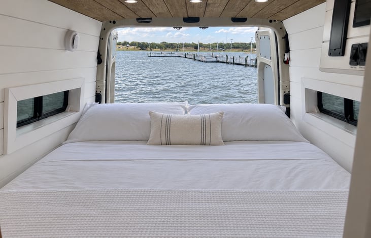 Imagine waking up to this! Relax in a cozy queen bed, open the rear doors and enjoy your morning coffee with a new view every day.