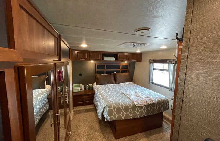 Primary bedroom with queen bed.