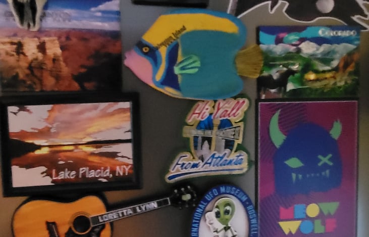 Please add a fridge magnet from your travels :)