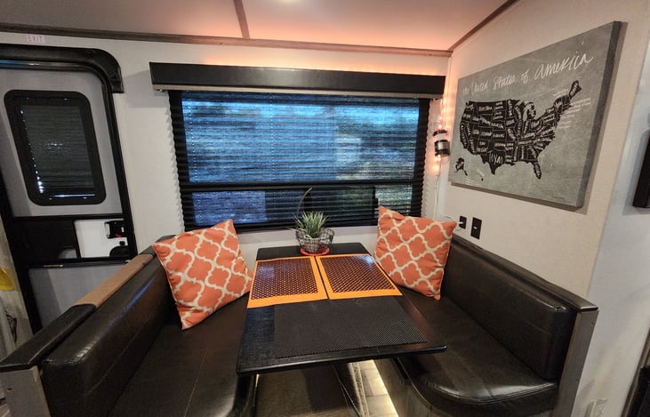 Cozy dinette table that seats 2 Adults and 2 kids. Extra seating at the theatre recliners