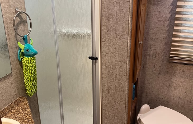 Bathroom, plenty of room to move around. Nice shower stall. Plenty of storage. 2 access doors, 1 from the hall and 1 from the bedroom for privacy.