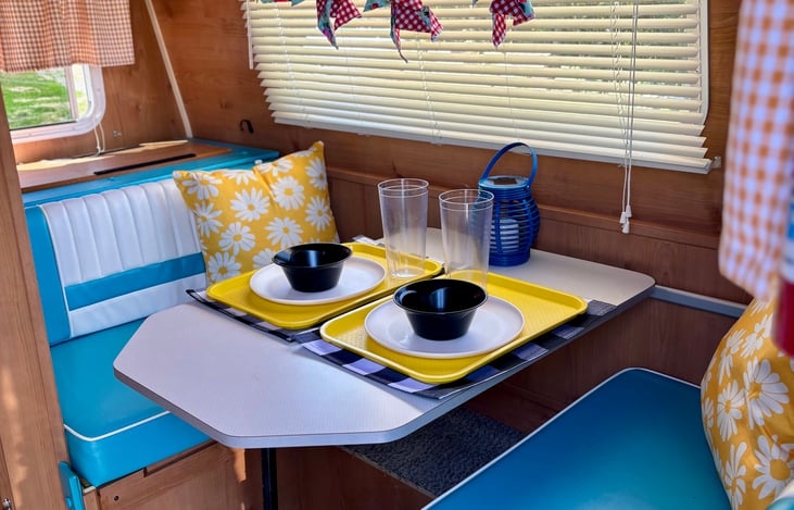 tabletop can slide back and forth for different spacing over bench seats