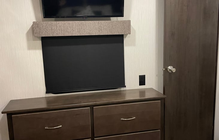 Master dresser, window, tv