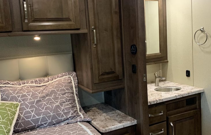 Bathroom sink across from shower