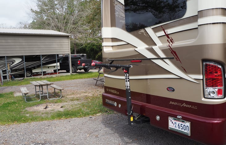 Vehicle w/ extra charge bike rack