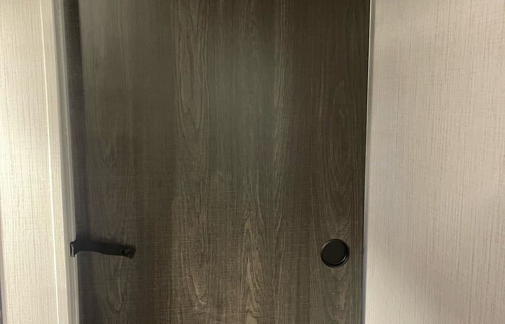 Door that slides for privacy in master bedroom