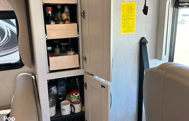 Pantry with cups and essentials