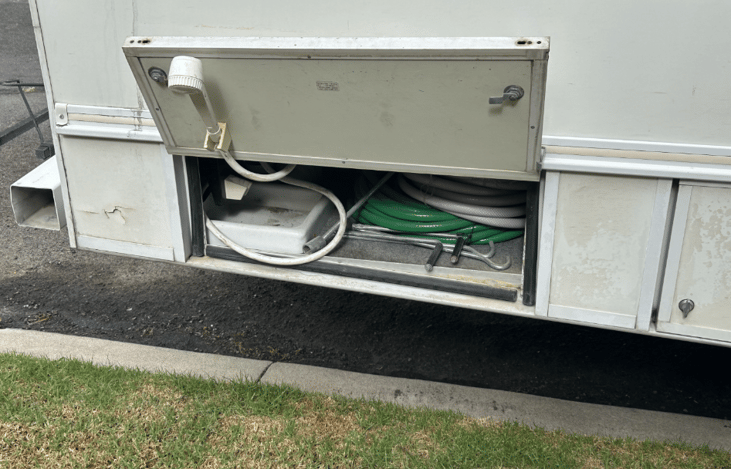 Outdoor shower to rinse off sandy toes, dirty shoes, and puppy paws
