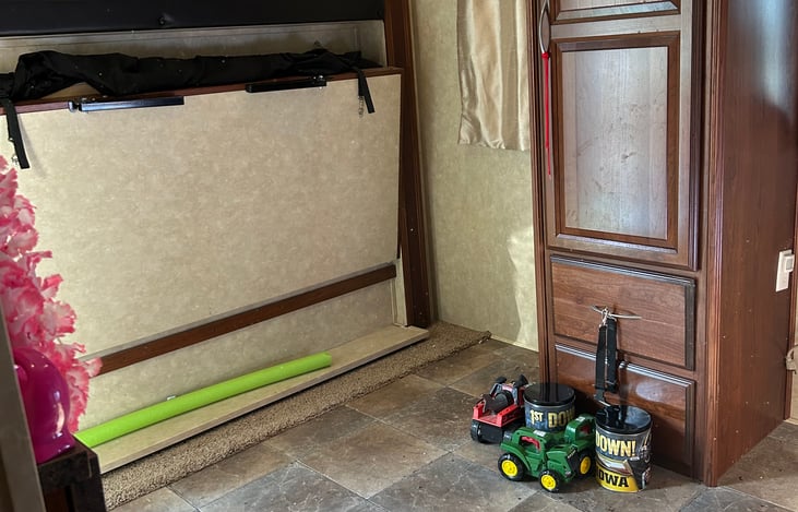 Rear bunkhouse has two twin  top bunks with 200 pound capacity rear fold down bunk, twin sized 250 pound capacity and full-sized futon.