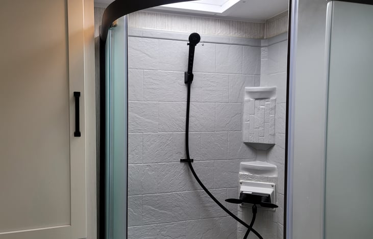 Taking a shower under the natural lighting from the sky opening is everything.