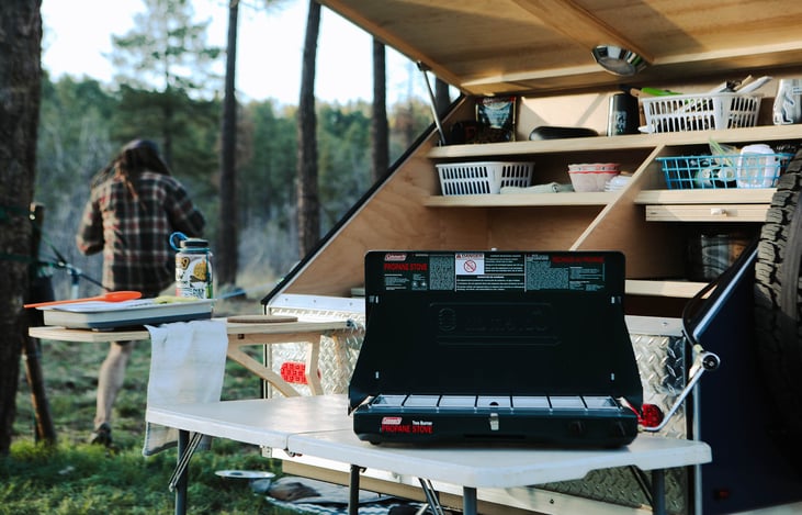 Kitchen setup with provided stove and side table