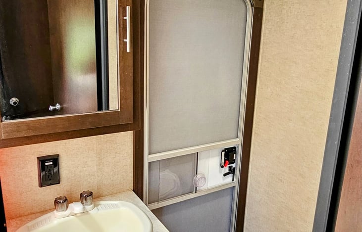 Bathroom with entrance from outside as well as inside