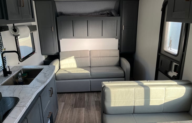 Sofa for use when Murphy bed is stowed away.