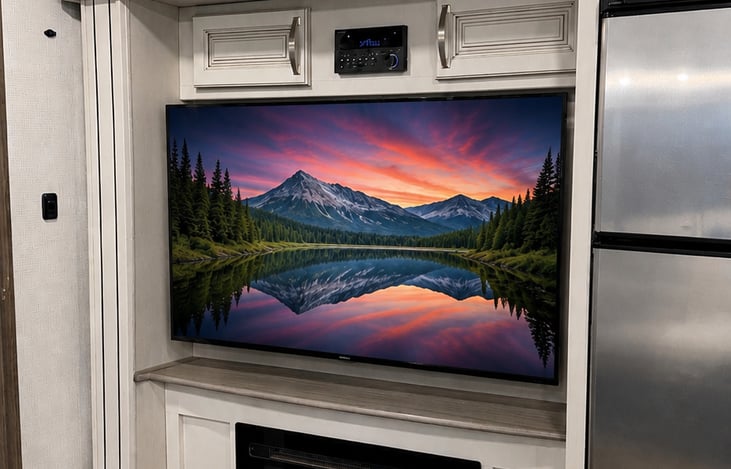 Entertainment center with a cozy fireplace
