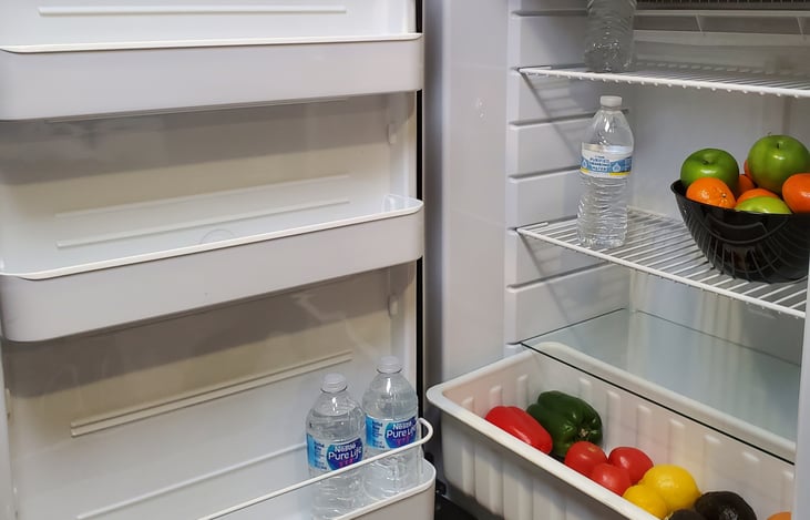 Indoor fridge has lots of shelves and space