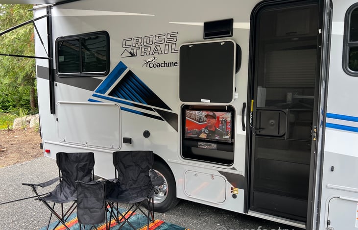 Sit outside with the awning open and watch some TV !