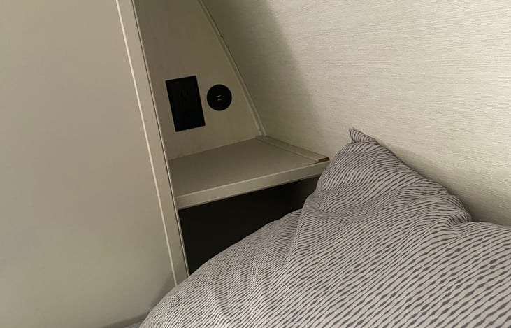 Two USB plug-ins for your phones
And two electrical outlets
The same on the other side of the bed