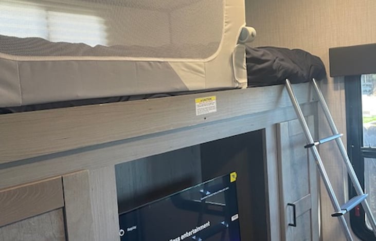 Upper bunk and TV