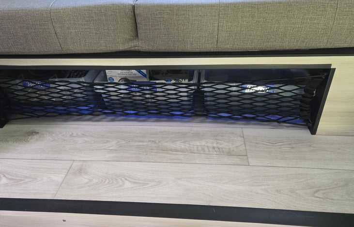 Under couch storage (blankets, games, extra supplies)