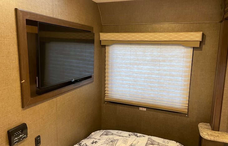 just added anew tv in the bedroom with a hard drive full of movies.
You can enjoy movies when your boon docking! Also runs off generator and solar panels.