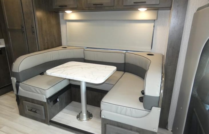 DINING AREA.  ALSO TURNS INTO A BED