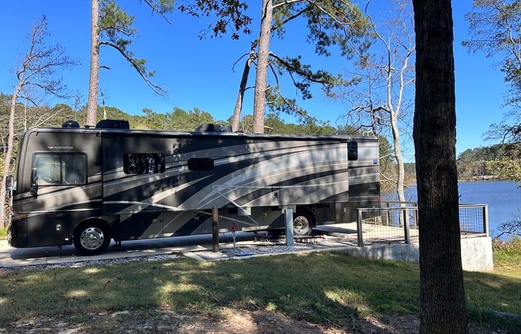 Our coach is equipped with one super slide and two smaller opposing slides making the inside area a very spacious cooled and heated area. This feature elevates it to the “Glamping” status!