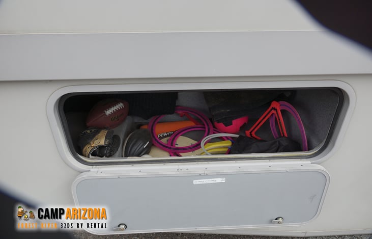 Packed with frisbees, baseball bat etc.