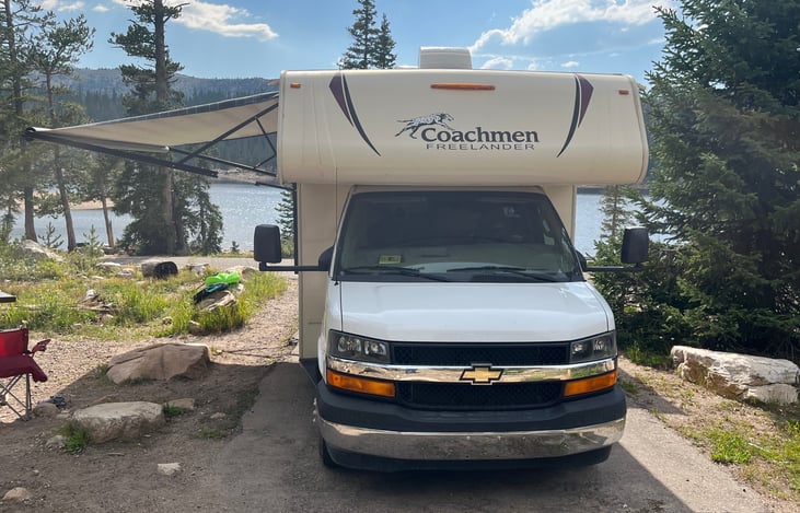 Large awning goes in and out with the push of a button. led lights are mounted under the awning to make the outdoor space comfortable even after dark.