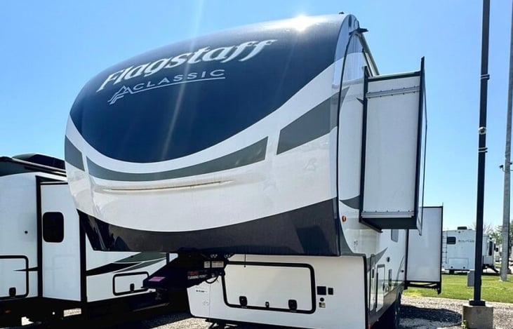 Fifth Wheels give you more head space on the interior. We do delivery only on our fifth wheels due to the challenge of driving them and needing a specialized hitch.