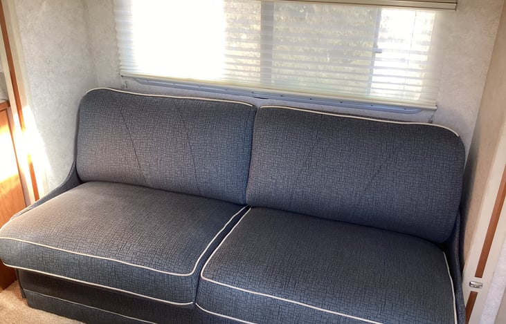 Couch folds down into bed