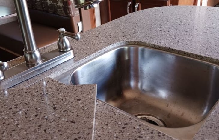 Stainless steel double sink.