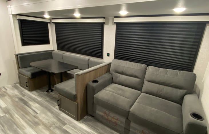 U-Shaped dinette and jackknife sofa