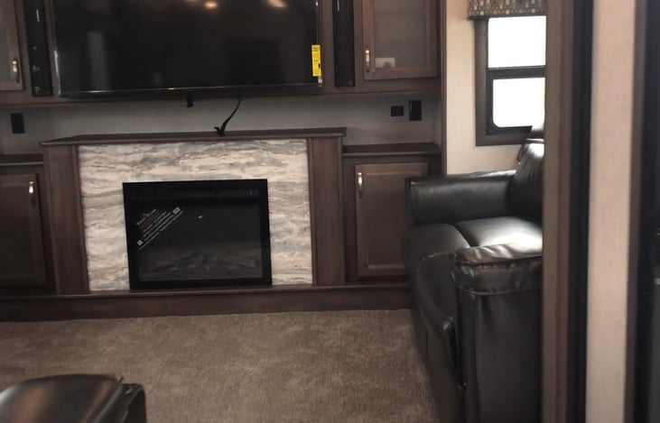 Living Room. Two pull out beds on each side and a love seat with mood lighting.