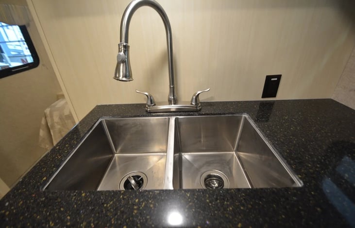 Quartz countertops and stainless steel sink