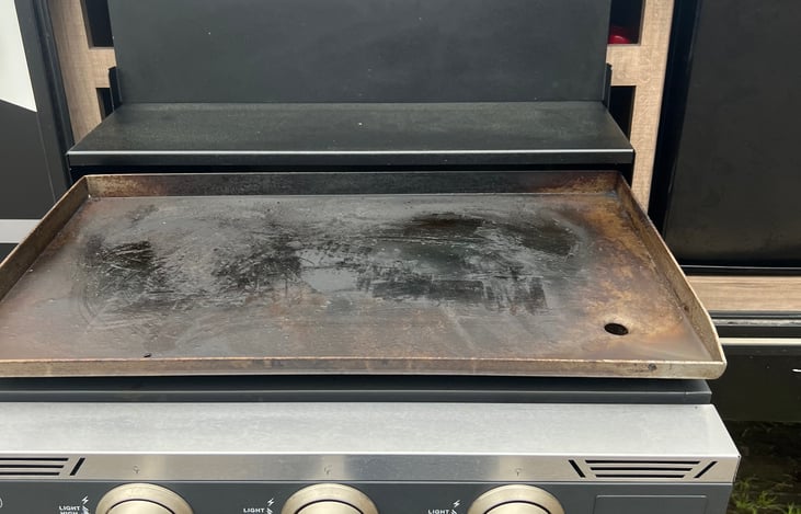 Outdoor propane flat top grill.