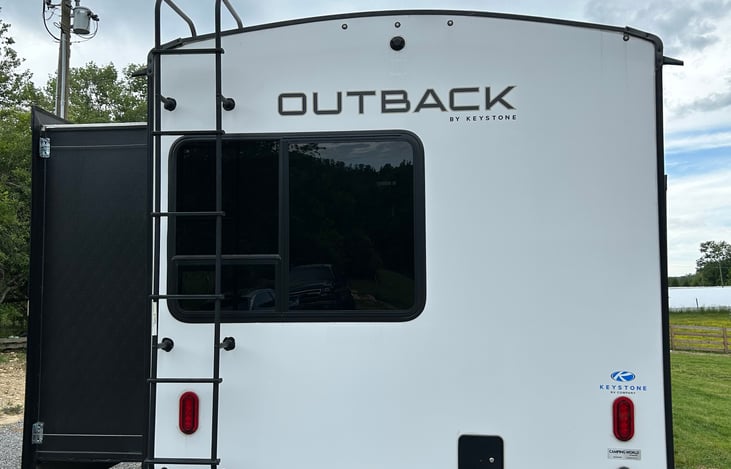 Fully loaded Keystone Outback equipped with 3 slides, spacious living room, private bunkhouse, large outdoor kitchen, large pop-up TV, outdoor speakers, spacious bathroom, and more. Sleeps 10!