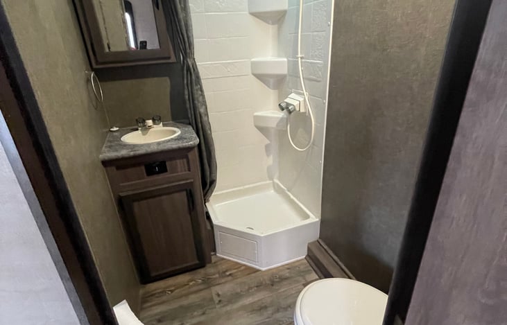 Private restroom, medicine cabinet, spacious shower!