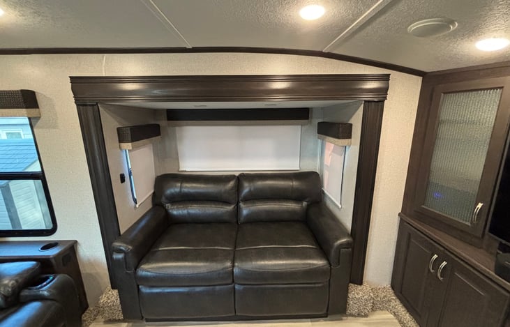 2 sets of trifold couches to watch TV or have kids/guests sleeping area