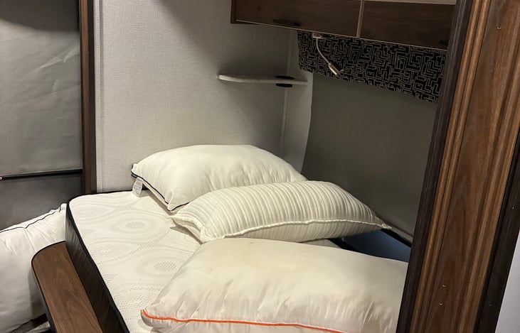 This space includes a queen sized bed after the pullout is extended. The bed is very comfortable.